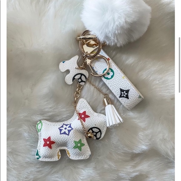 Mono puppy dog puff ball keychain new - Picture 1 of 1